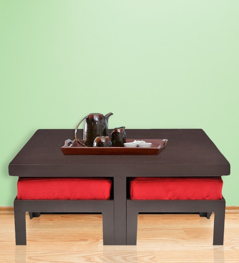 Buy Trendy Coffee Table with Four Red Cushioned Stools by ARRA Online
