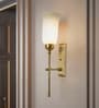 Transitional Antique Brass Long Wall Sconce with Milky Glass Shade