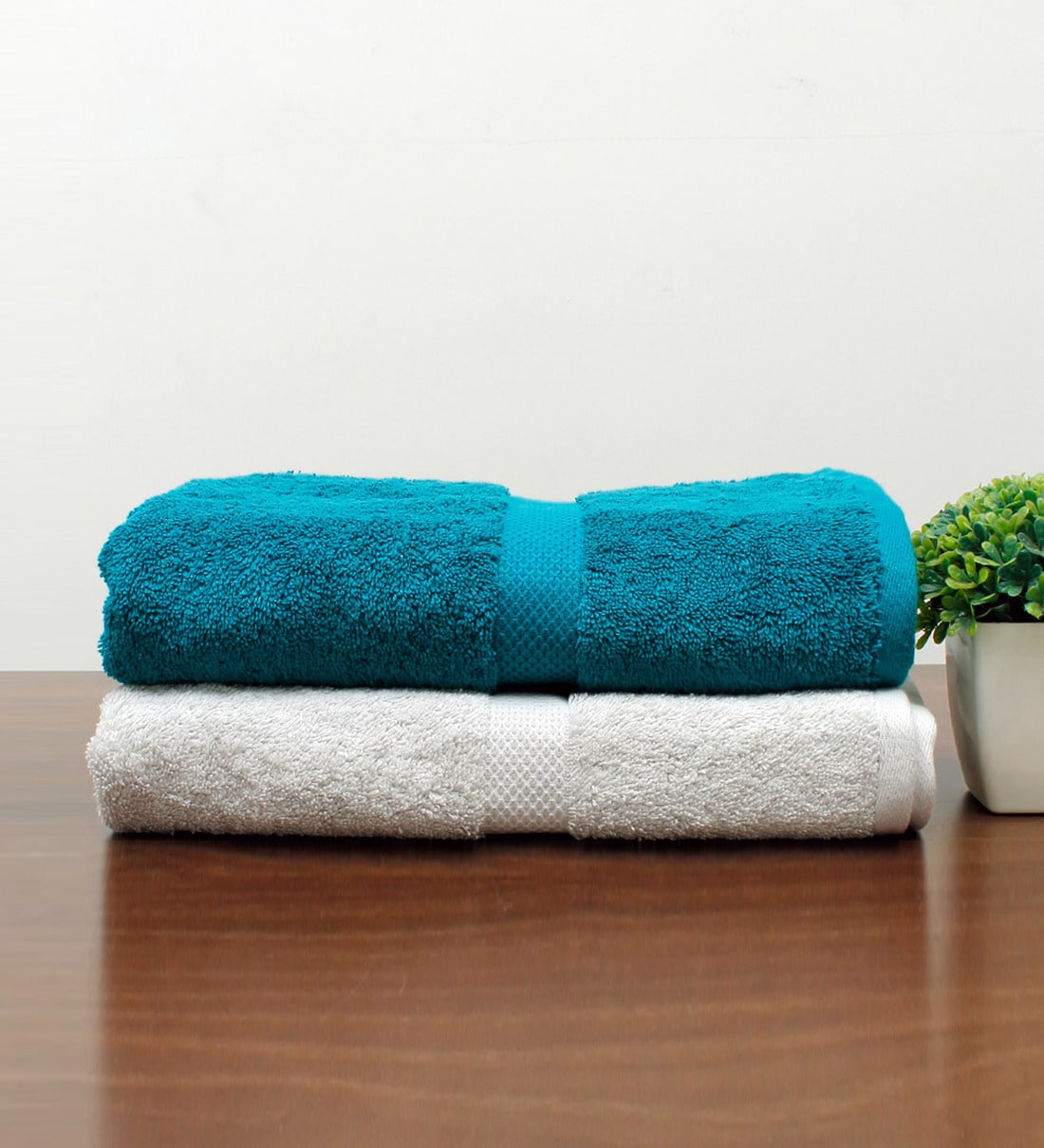 turquoise towels and bath mats