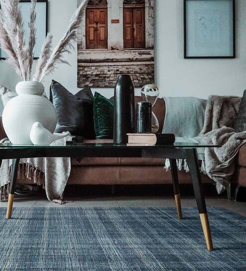 Turquoise Solid 100% Wool 5 ft x 7 ft Hand Tufted Carpet by Saraswati Global