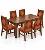 Vajra 6 Seater Dining Set In Provincial Teak Finish With Terracotta Orange Colour Chair Vajra 6 Seater Dining Set In Provincial Teak Finish With Terracotta Orange Colour Chair