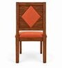 Vajra 6 Seater Dining Set In Provincial Teak Finish With Terracotta Orange Colour Chair Vajra 6 Seater Dining Set In Provincial Teak Finish With Terracotta Orange Colour Chair