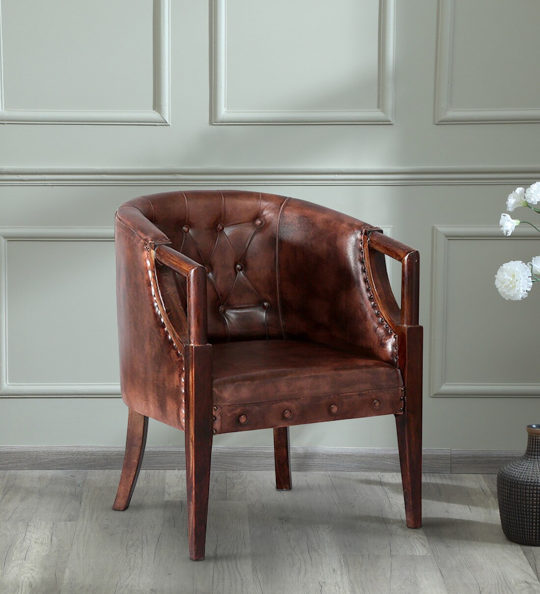 brown upholstered armchair