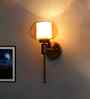 Wall Sconce with Kachori Amber Glass Shade