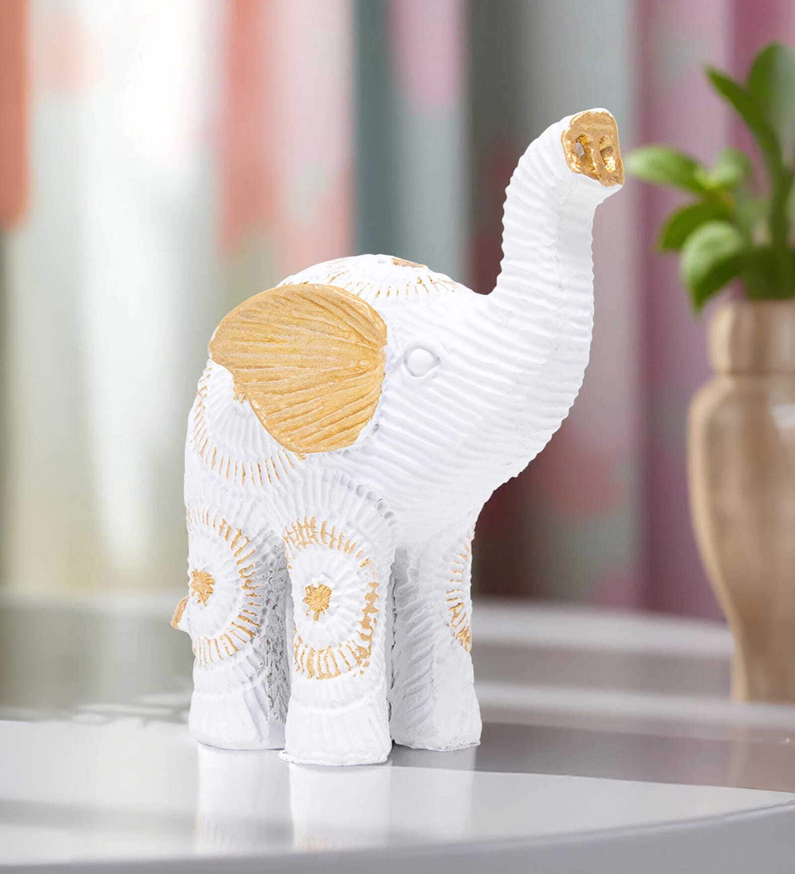 White and Gold-toned Elephant Showpieces