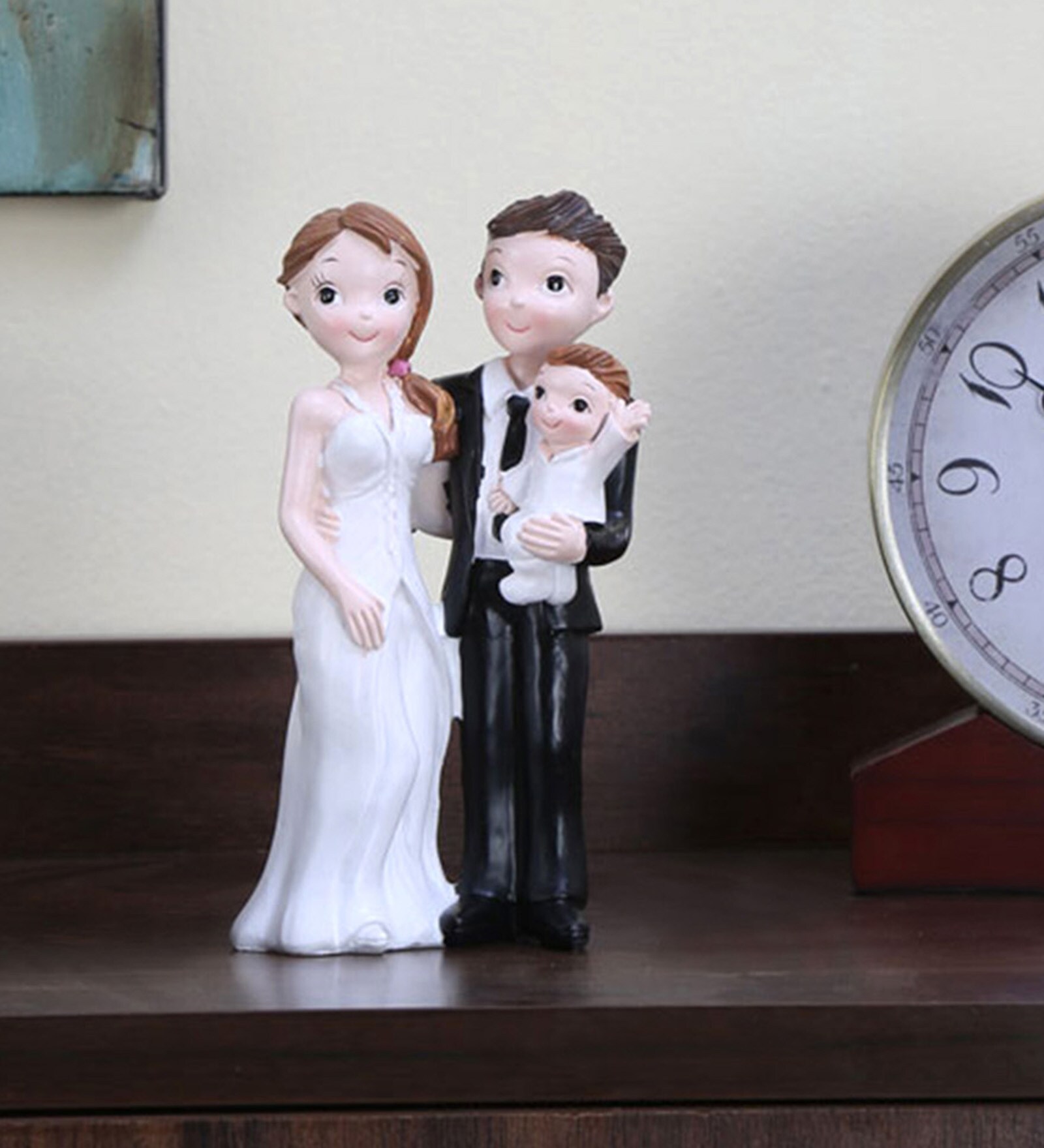 Buy White Polyresin Couple Holding Kid Figurine by home Online Human Figurines Human