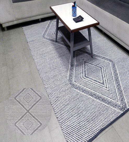 White Geometrical Cotton 8X5 Feet Hand Woven Carpet