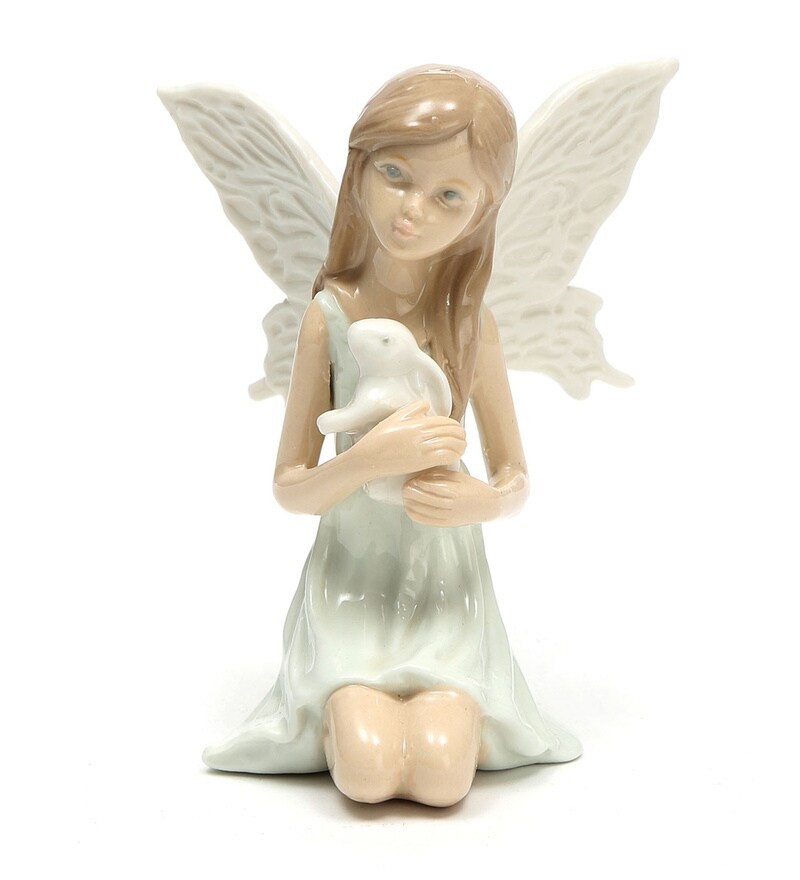 Buy White Porcelain Fairy With Rabbit Showpiece by @home Online - Human ...