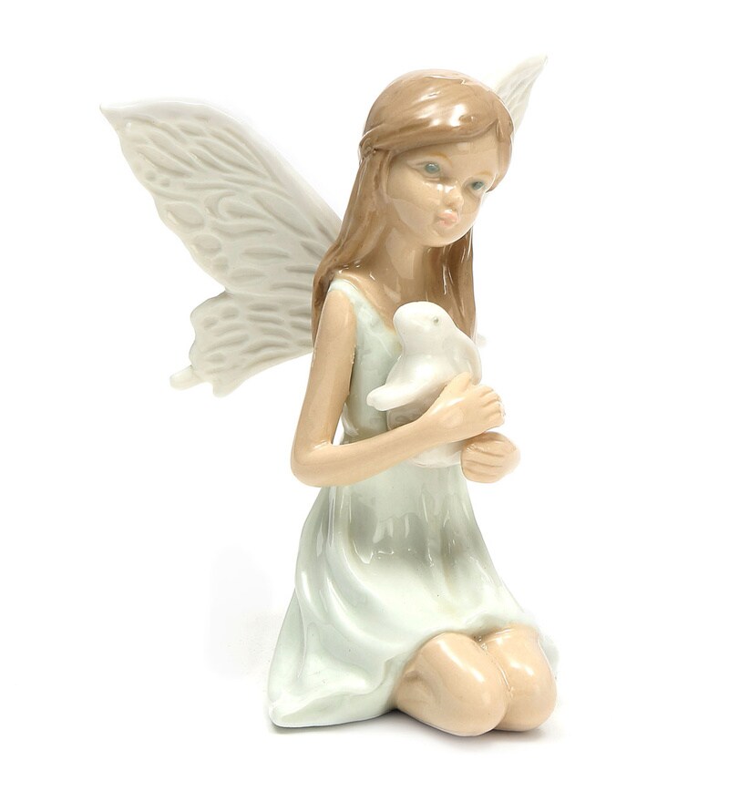Buy White Porcelain Fairy With Rabbit Showpiece by @home Online - Human ...