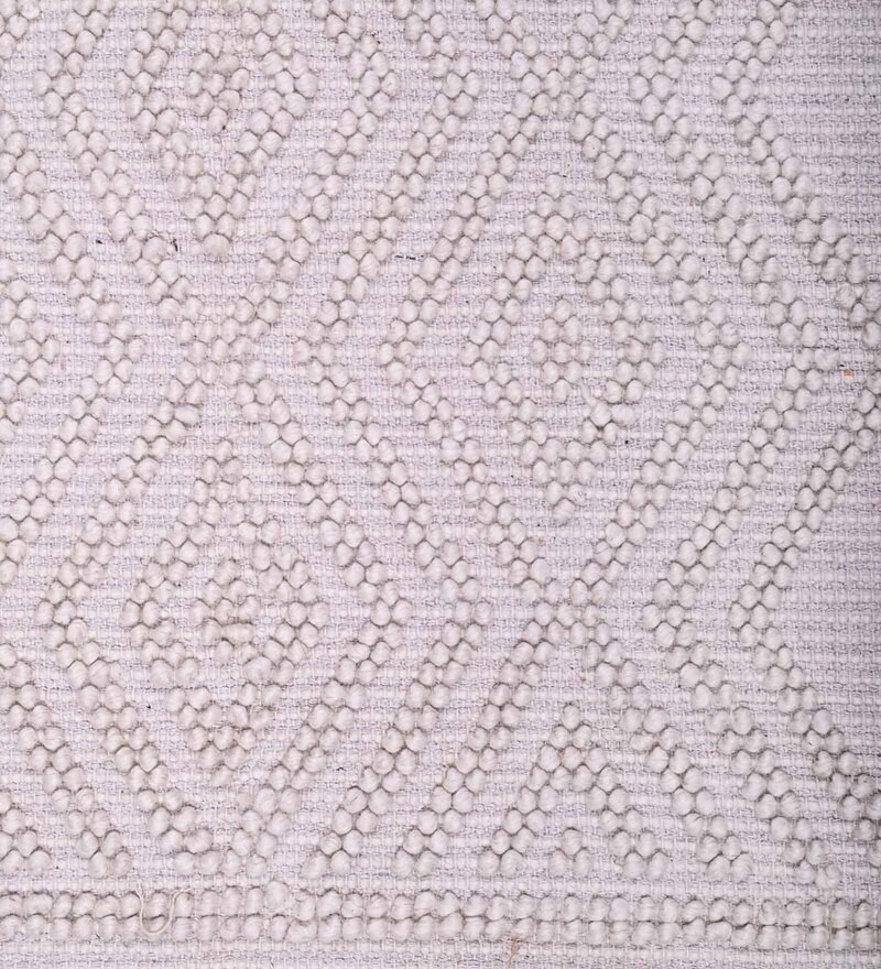 Buy White Wool Plain Solids 5 ft x 8 ft Hand Woven Carpet by