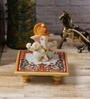 White Lord Ganesha with Crown On Marble Chowki
