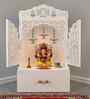 White Wooden Floor Pooja Mandir with Laser-Cut Lotus & Bell Doors Shubh Labh Design Hanging Diya Motifs & Storage Cabinet