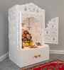 White Wooden Floor Pooja Mandir with Laser-Cut Lotus & Bell Doors Shubh Labh Design Hanging Diya Motifs & Storage Cabinet