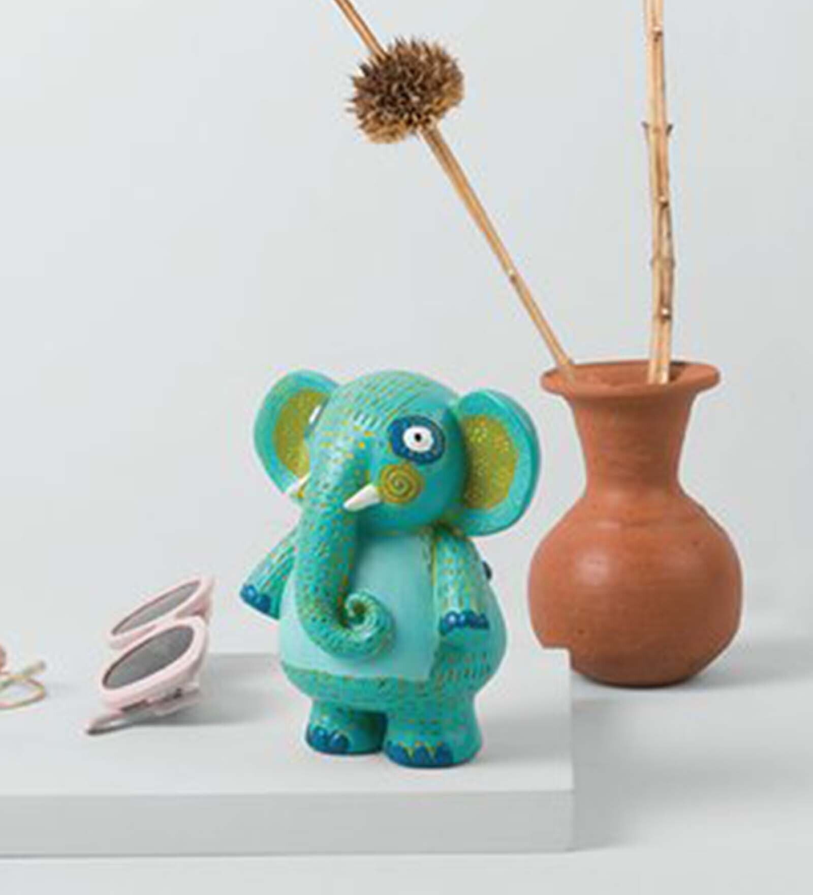 Buy Wide Eyed Elephant Polyresin Animal Figurine by Chumbak at 5 OFF by Chumbak Pepperfry
