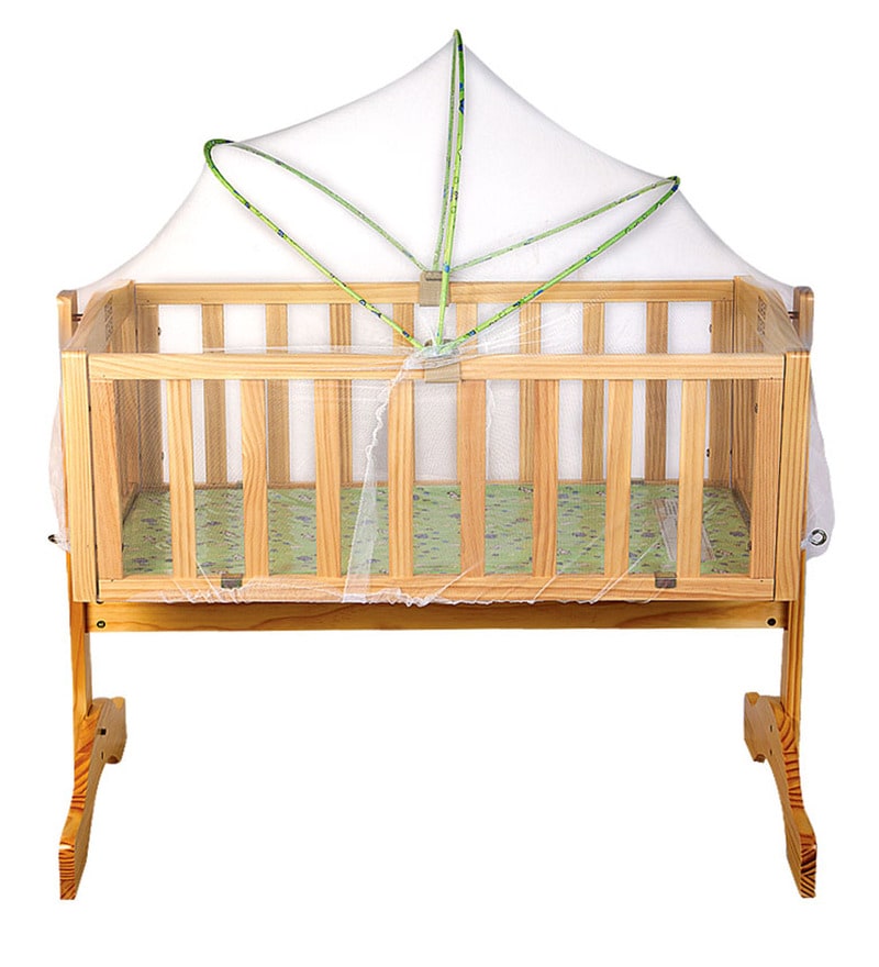 wooden cradle with mosquito net