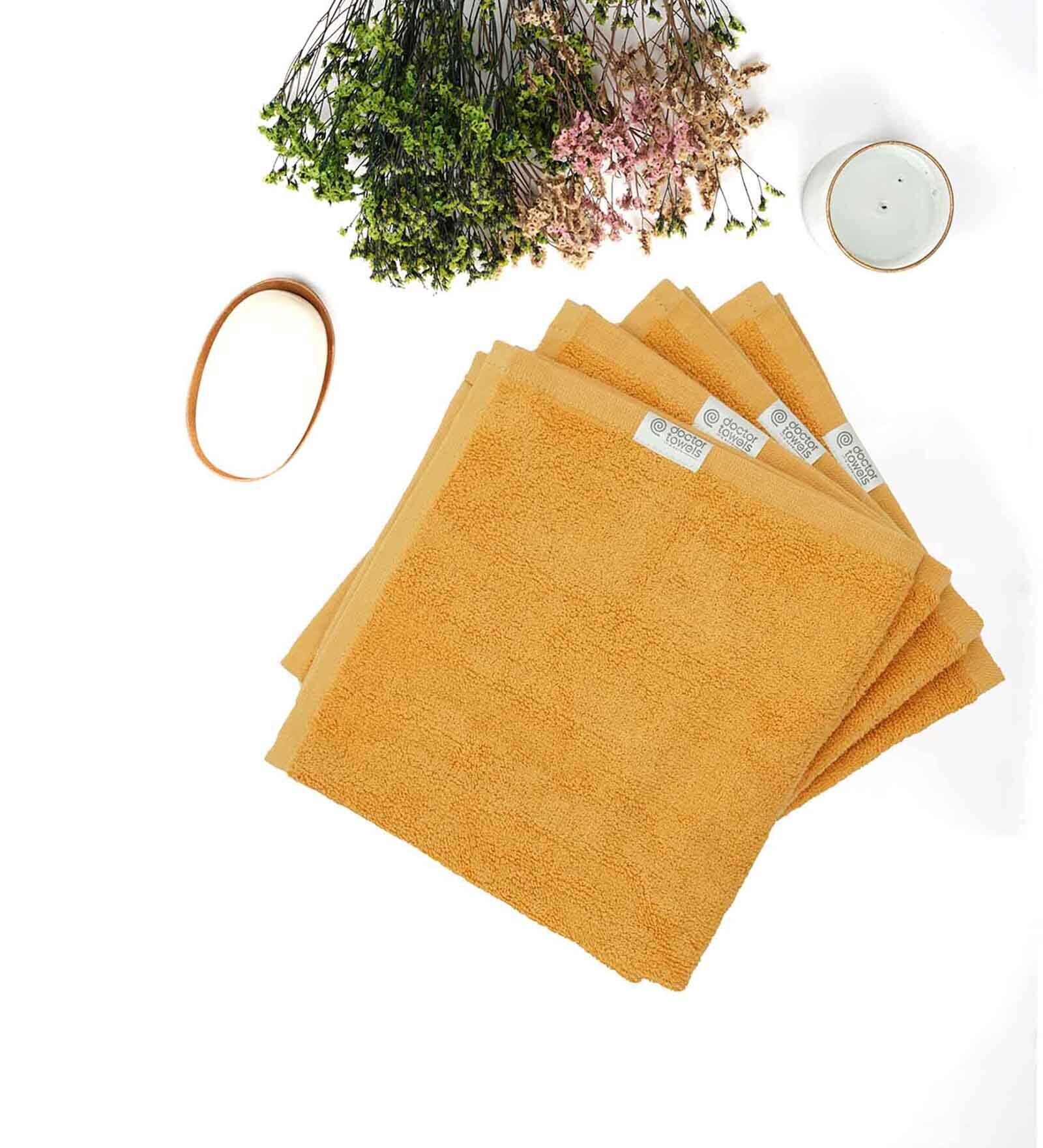 Buy Yellow Cotton and Viscose Solid 480 GSM 4 Pcs Face Towel by DOCTOR