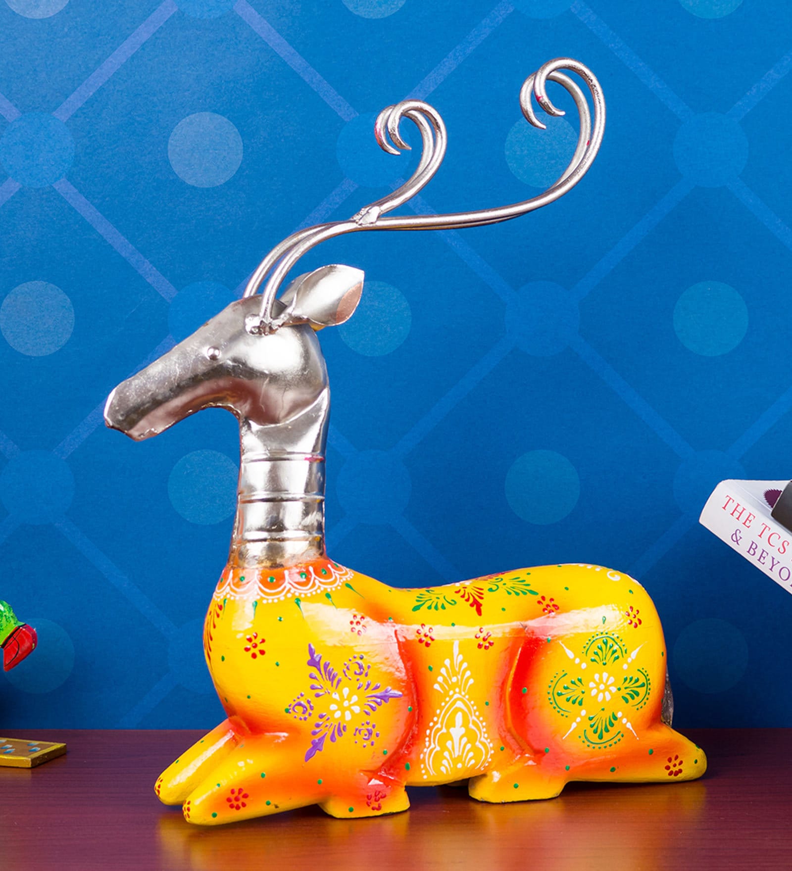 Yellow Handicraft Sitting Deer Showpiece