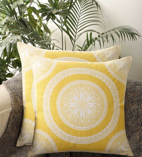 https://ii1.pepperfry.com/media/catalog/product/y/e/494x544/yellow-cotton-floral-18x18-inches--set-of-2--cushion-covers-by-kushadri-yellow-cotton-floral-18x18-i-q95dqf.jpg