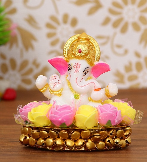Yellow Polyresin Lord Ganesha Playing Dholak Idol