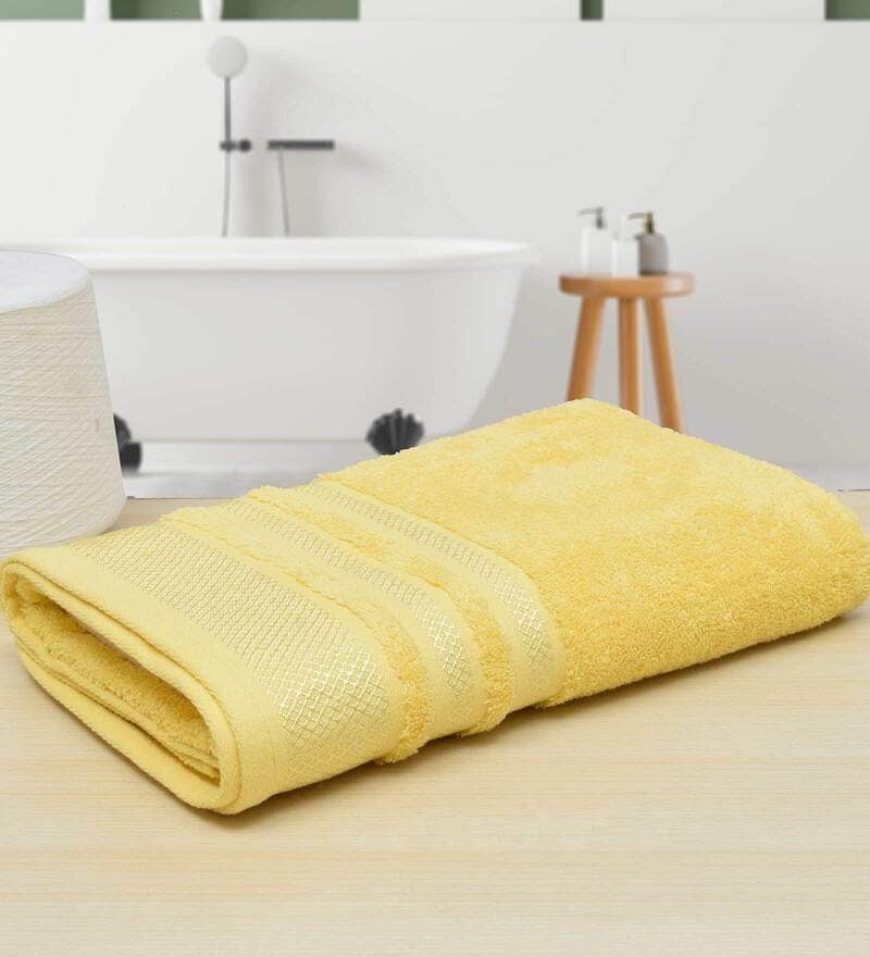 yellow towels and bath mats