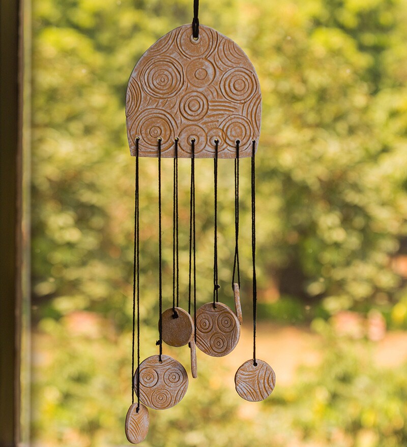 Buy Yellow Terracotta 7 Bells Wind Chime by ExclusiveLane Online Feng