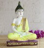 Yellow Buddha Decorative Showpiece