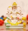Yellow Polyresin Crystal Car Ganesha Showpiece