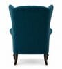 Zeloria Teak Wood High Back Wing Chair With Suede Fabric In Blue Colour Zeloria Teak Wood High Back Wing Chair With Suede Fabric In Blue Colour