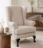 Zenvira Teak Wood Wing Chair With Suede Fabric In Ivory Beige Colour Zenvira Teak Wood Wing Chair With Suede Fabric In Ivory Beige Colour