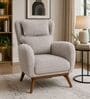 Zorella Teak Wood Wing Chair With Suede Fabric In Beige Colour Zorella Teak Wood Wing Chair With Suede Fabric In Beige Colour